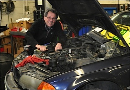 Co-owner Jim working on an engine